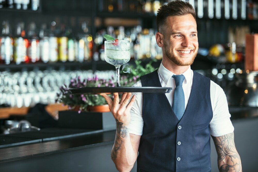 Bartender serving drink